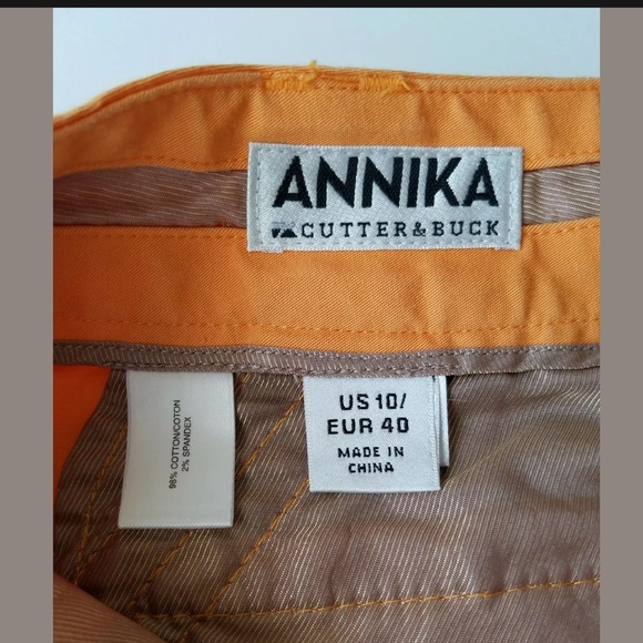 Annika Cutter and Buck Woman’s Orange Golf Shorts - Picture 4 of 7